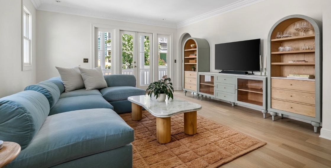 Charleston vacation rental living room with comfortable seating and modern furnishings